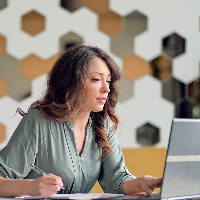 Woman-working-on-computer-new